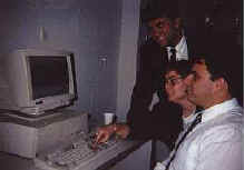 renactment of the "turning on ceremony" at ircsa, Christo standing, Chuckie seated.