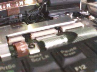 the key pad connectors up close, it's the copper coloured one on the left that is the problem.